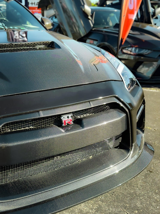 Nissan GTR Nismo Black Edition Track Edition Premium Base CBA DBA 2008 2009 2010 2011 2012 2013 2014 2015 2016 (for installation on 2017 2018 2019 2020 2021 2022 2023 2024 vehicles, 2008 2009 2010 2011 2012 2013 2014 2015 2016 hood is recommended) with Aftermarket Parts - "Godzilla" Narrow Body Front Bumper & Front Lip Carbon Fiber / FRP from Robot Craftsman