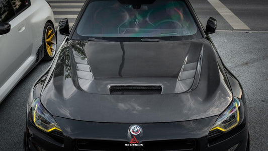 BMW M2 / C G87 2023 2024 & 2 Series 230i M240i G42 2022 2023 2024 with Aftermarket Parts - AE Style Hood Bonnet Double-sided Carbon Fiber from ArmorExtend