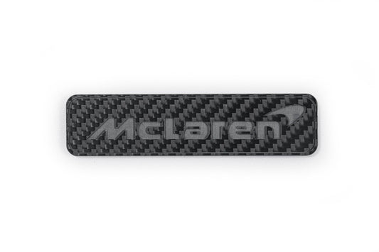 McLaren 570GT 2017 2018 2019 & 540C 570S 2016 2017 2018 2019 2020 & 600LT 2019 2020 & 620R 2021 & 675LT 650S 2015 2016 & 720S 2018 2019 2020 2021 2022 2023 & 750S 2024-ON & 765LT 2021 2022 & Artura 2023-ON & Elva 2021 & GT 2020 2021 2022 2023 & GTS 2025-ON & MP4-12C 2012 2013 2014 & P1 2013 2014 2015 & Senna 2019 2020 with Aftermarket Parts - Emblem Badge Carbon Fiber