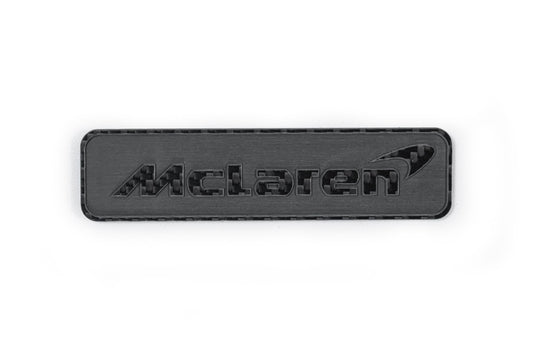 McLaren 570GT 2017 2018 2019 & 540C 570S 2016 2017 2018 2019 2020 & 600LT 2019 2020 & 620R 2021 & 675LT 650S 2015 2016 & 720S 2018 2019 2020 2021 2022 2023 & 750S 2024-ON & 765LT 2021 2022 & Artura 2023-ON & Elva 2021 & GT 2020 2021 2022 2023 & GTS 2025-ON & MP4-12C 2012 2013 2014 & P1 2013 2014 2015 & Senna 2019 2020 with Aftermarket Parts - Emblem Badge Carbon Fiber