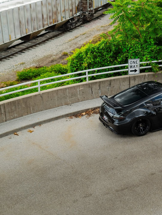 Nissan 370Z Sport Touring Base Fairlady Z Z34 Pre-Facelift & Facelift 2009 2010 2011 2012 2013 2014 2015 2016 2017 2018 2019 2020 & Nismo V1 2009 2010 2011 & Nismo V2 2012 2013 2014 2015 2016 2017 2018 2019 2020 with Aftermarket Parts - Nismo Conversion Style Rear Spoiler Carbon Fiber / FRP from EPR USA