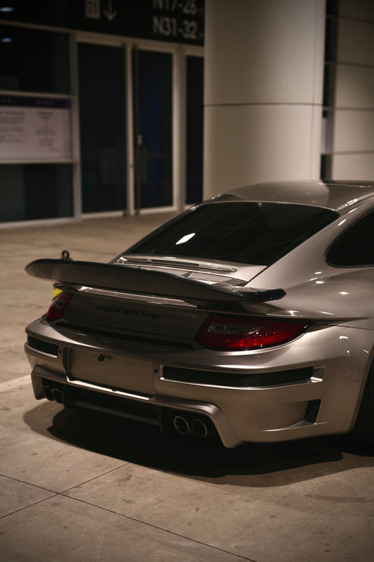 Porsche 911 997.1 997.2 Carrera Base S 2009–2012 (997.1 requires 997.2 taillights) with Robot Craftsman's Aftermarket Parts - Package A "TIGANISM GUSTAV" Carbon Fiber / FRP
