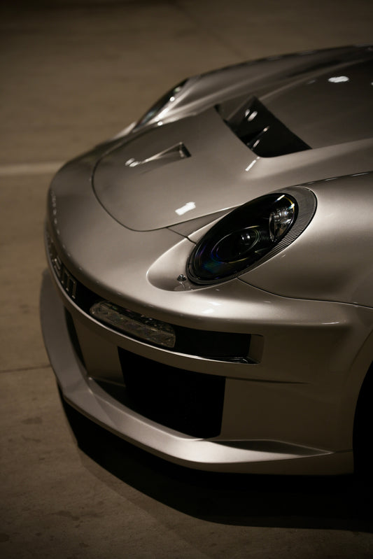 Porsche 911 997.1 997.2 Carrera Base S 2009–2012 (997.1 requires 997.2 taillights) with Robot Craftsman's Aftermarket Parts - Package A "TIGANISM GUSTAV" Carbon Fiber / FRP