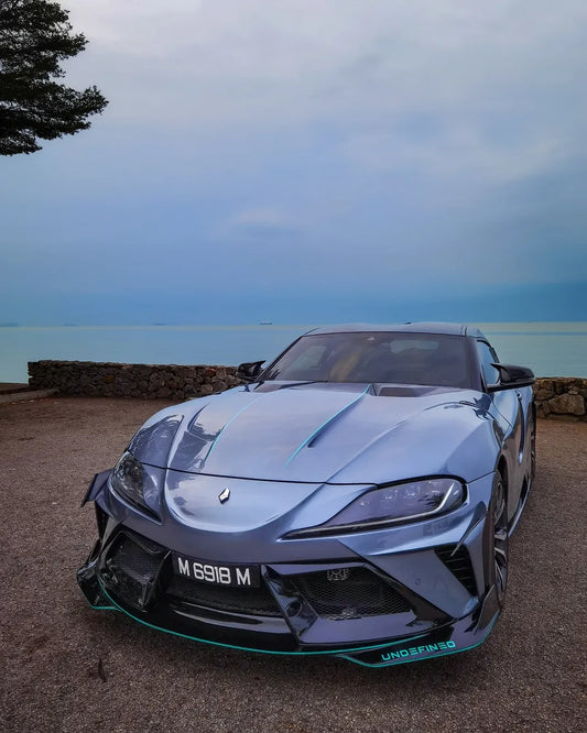 Toyota Supra MK5 A90 A91 3.0 2.0 2020 2021 2022 2023 2024 with Aftermarket Parts - "Alerion" Narrow Body Front Bumper & Lip Carbon Fiber / FRP from Robot Craftsman