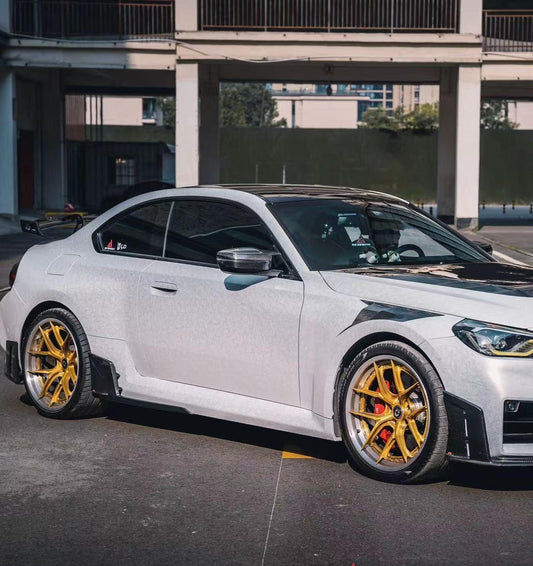 BMW M2 & M2C G87 2023 2024 with Aftermarket Parts - ART Style Side Skirts Carbon Fiber from ArmorExtend