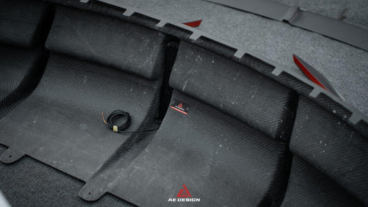 Your Tesla Model Y 2020 2021 2022 2023 2024 with Aftermarket Parts - AE Style Rear Diffuser Carbon Fiber from ArmorExtend