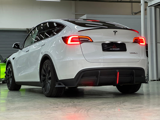 Your Tesla Model Y 2020 2021 2022 2023 2024 with Aftermarket Parts - AE Style Rear Diffuser Carbon Fiber from ArmorExtend