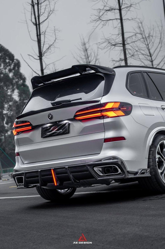 BMW X5 G05 M50i X/S Drive 40i (with M-Package) (Fits Both Pre-LCI & LCI) 2019 2020 2021 2022 2023 2024 with Aftermarket Parts - AE Style Rear Roof Spoiler Carbon Fiber from ArmorExtend