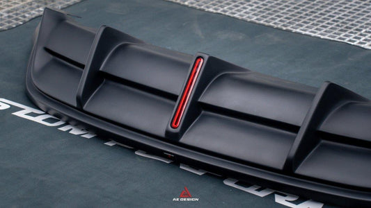 Tesla Model Y 2021 2022 2023 2024 with Aftermarket Parts - Plustic Style Rear Diffuser ABS from ArmorExtend