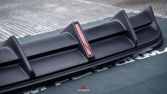 Tesla Model Y 2021 2022 2023 2024 with Aftermarket Parts - Plustic Style Rear Diffuser ABS from ArmorExtend