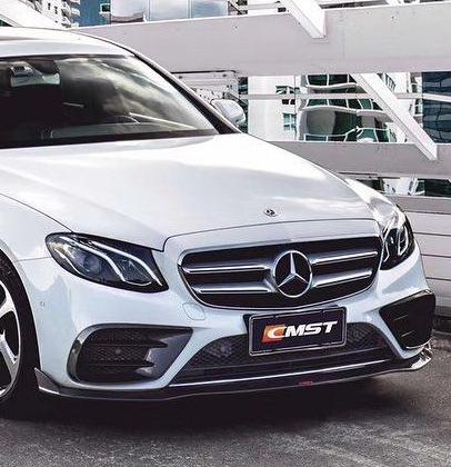 Mercedes Benz E-Class E550 E450 E400 E350 E300 W213 2017-2023 (fitment requires sport package bumper) with Aftermarket Parts - Front Lip Carbon Fiber/FRP from CMST Tuning