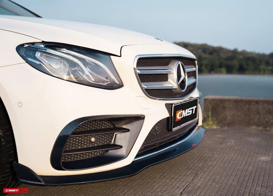 Mercedes Benz E-Class E550 E450 E400 E350 E300 W213 2017-2023 (fitment requires sport package bumper) with Aftermarket Parts - Front Lip Carbon Fiber/FRP from CMST Tuning