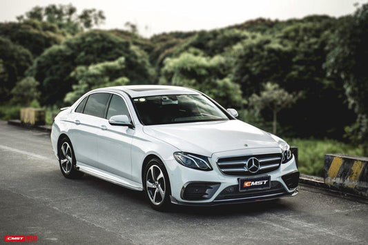 Mercedes Benz E-Class E550 E450 E400 E350 E300 W213 2017-2023 (fitment requires sport package bumper) with Aftermarket Parts - Front Lip Carbon Fiber/FRP from CMST Tuning