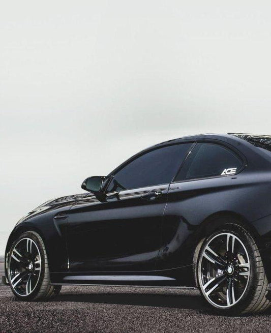 BMW F87 M2 M2C 2016-2021 with Aftermarket Parts - Vacuumed Carbon Side Skirts from CMST Tuning