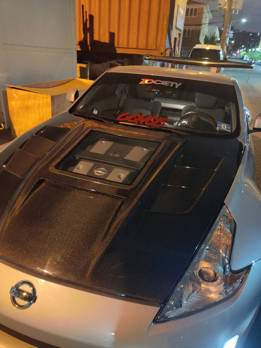 Nissan 370Z Nismo Sport Touring Base Fairlady Z Z34 2009-2020 with Aftermarket Parts - V1 Glass Clearview Style Hood Bonnet Carbon Fiber / FRP from CMST Tuning