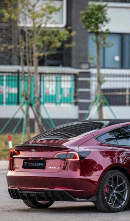Tesla Model 3 / Performance 2017-2023 with Aftermarket Parts - Pre-preg Carbon Fiber Rear Spoiler from TAKD Carbon