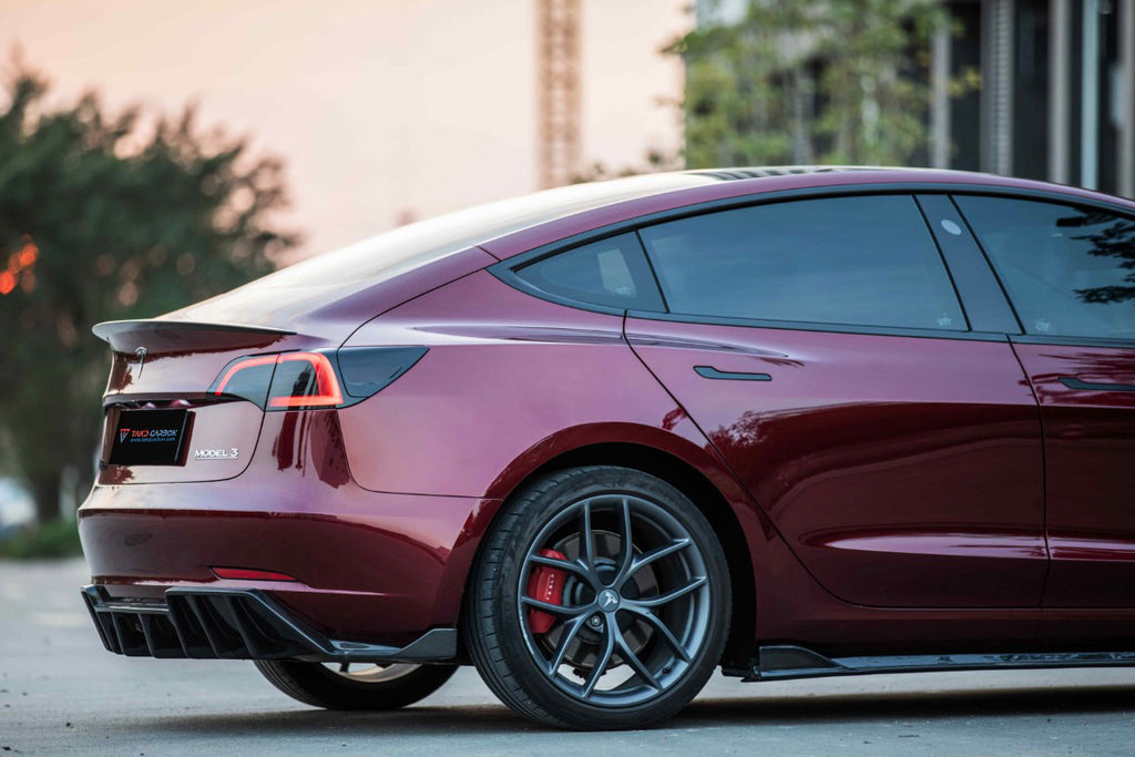 Tesla Model 3 / Performance 2017-2023 with Aftermarket Parts - Pre-preg Carbon Fiber Side Skirts from TAKD Carbon