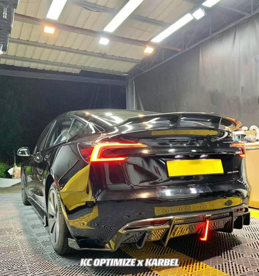 Tesla Model 3 Highland / Performance 2024-ON with Aftermarket Parts - With Light Style Rear Diffuser & Canards Pre-preg Carbon Fiber from Karbel Carbon