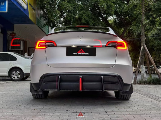 Tesla Model Y 2021 2022 2023 2024 with Aftermarket Parts - Plustic Style Rear Diffuser ABS from  ArmorExtend