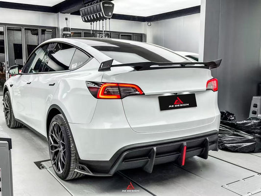 Your Tesla Model Y 2020 2021 2022 2023 2024 with Aftermarket Parts - AE Style Rear Diffuser Carbon Fiber from  ArmorExtend