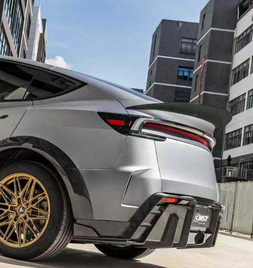 Tesla Model Y Juniper Base 2026-ON with Aftermarket Parts - Rear Bumper Carbon Fiber / FRP from CMST Tuning