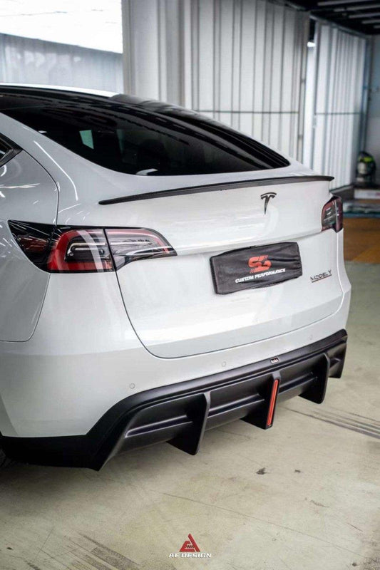 Tesla Model Y 2021 2022 2023 2024 with Aftermarket Parts - Plustic Style Rear Diffuser ABS from  ArmorExtend